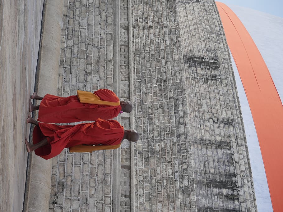 two man walking beside concrete wall, red, architecture, built structure HD wallpaper