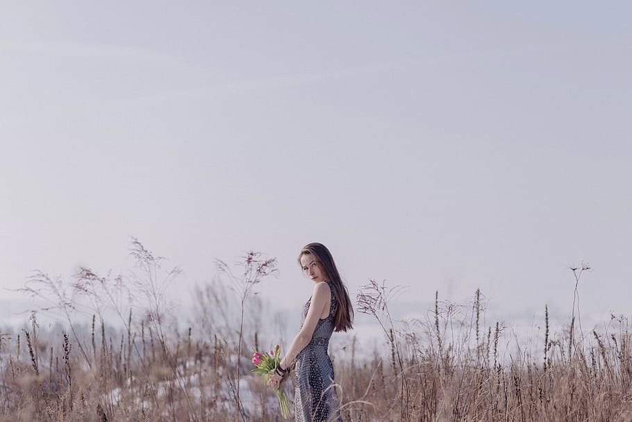 Woman Wearing Black and Grey Sleeveless Dress Standing on Field HD wallpaper