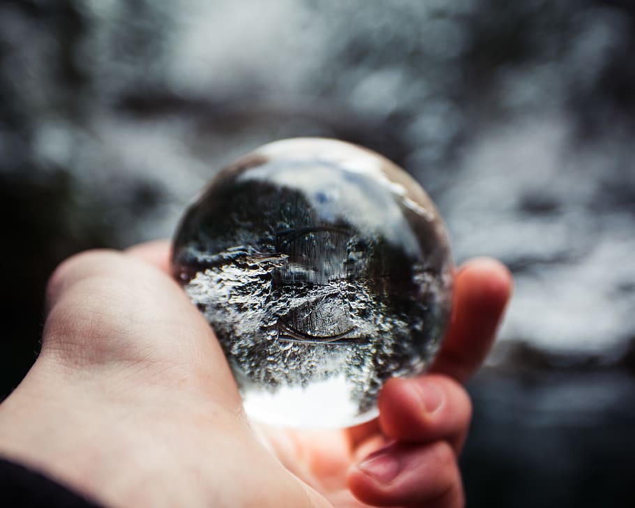 person holding crystal ball shallow focus photography, human, HD wallpaper