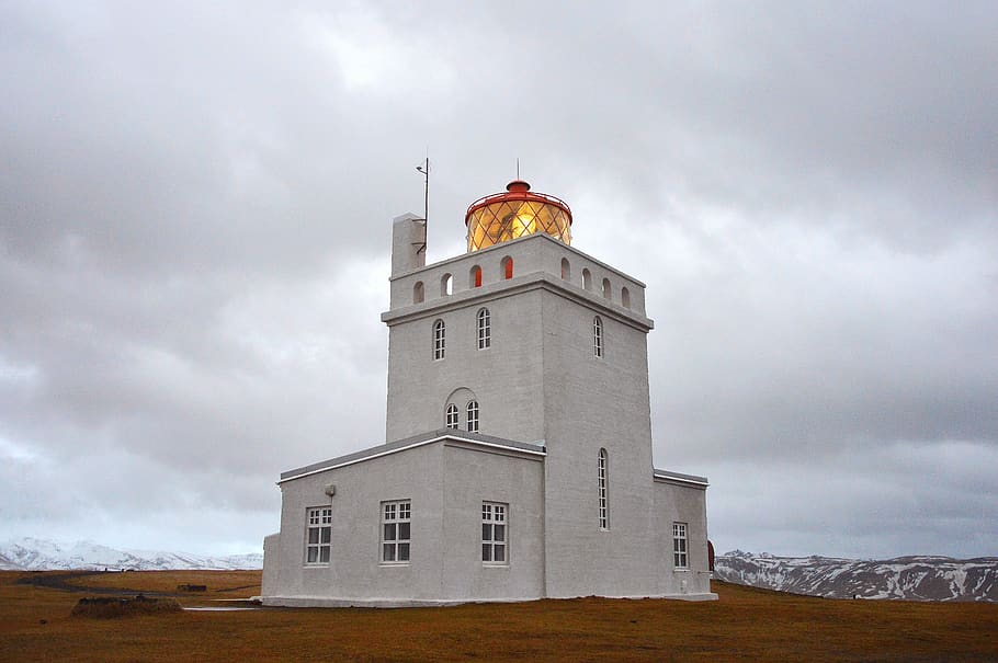 iceland, lighthouse, storm, cliff, seaside, architecture, cloud - sky HD wallpaper