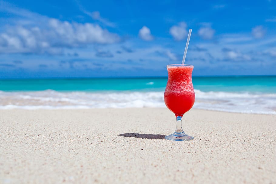 Red Slush Drink in Glass on Beach, beverage, cocktail, drinking glass