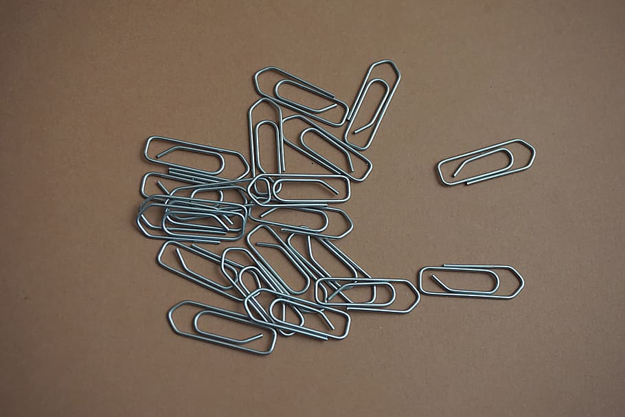 Gray Paper Clip on Brown Table, attachment, office supply, studio shot HD wallpaper