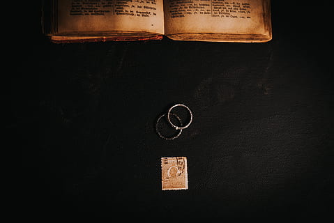 two silver-colored rings, book, text, novel, symbol, trademark HD wallpaper