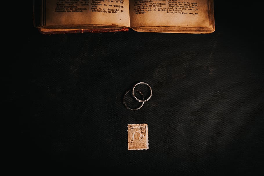 two silver-colored rings, book, text, novel, symbol, trademark HD wallpaper