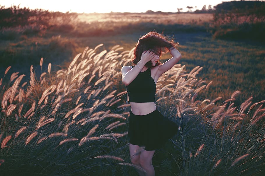 grass, outdoor, field, sunset, sunrise, people, girl, alone HD wallpaper