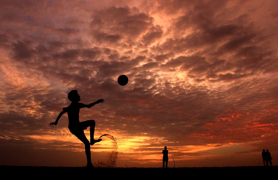 Silhouette of a Boy Playing Ball during Sunset, action, backlit, HD wallpaper