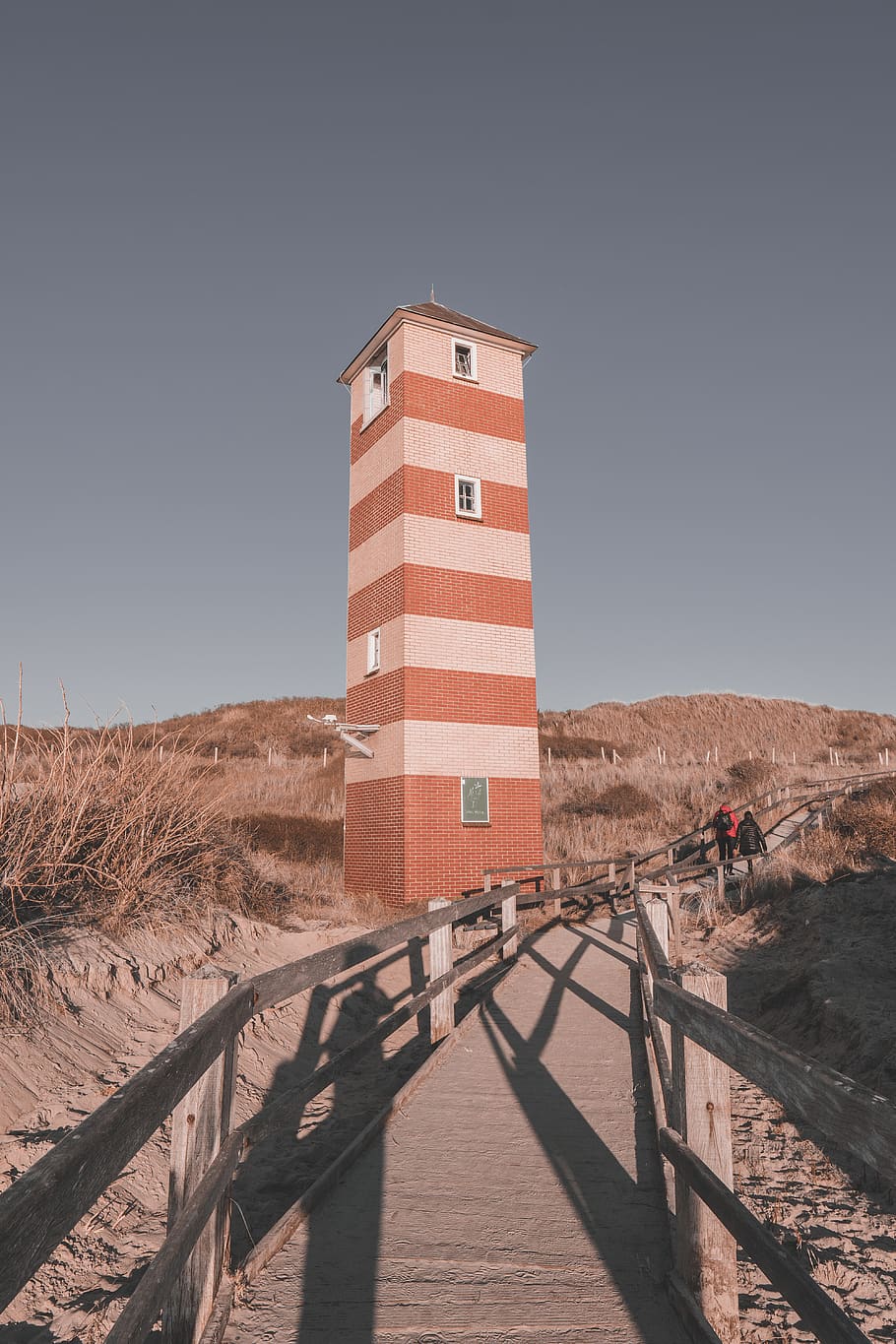 two person walking beside lighthouse, architecture, building HD wallpaper