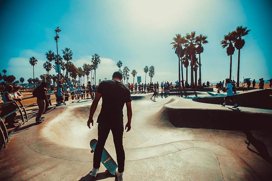 Man Standing on Skateboard Near Skate Park, balance, blue sky, HD wallpaper