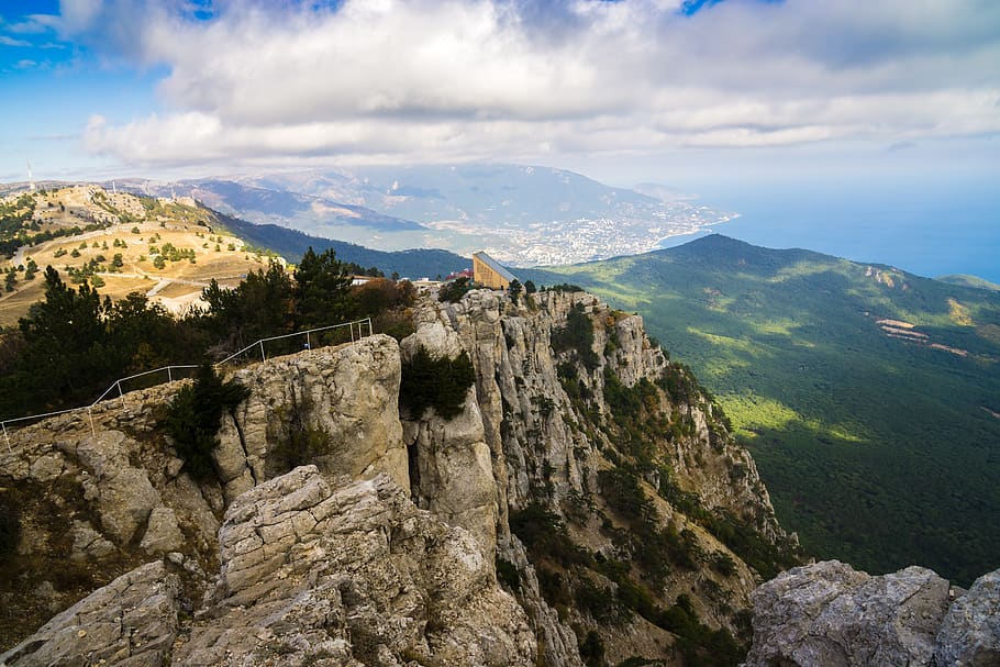 Aerial View Photography of Cliff, adventure, clouds, daylight HD wallpaper