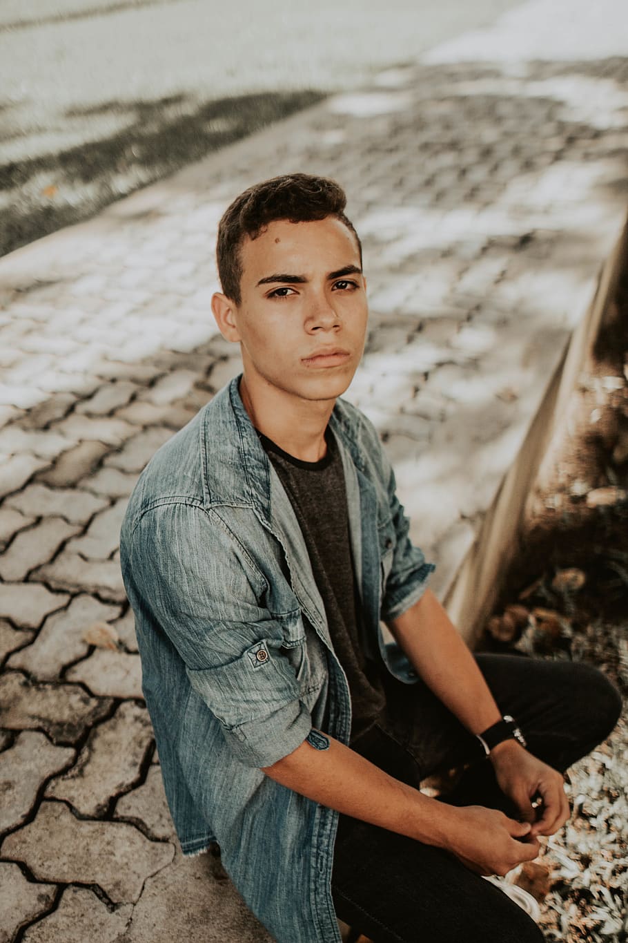 man sitting on pathway, human, person, apparel, clothing, walkway HD wallpaper