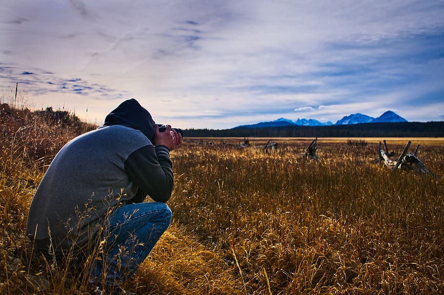 Man Taking Picture Outdoors, camera, clouds, cropland, crops HD wallpaper
