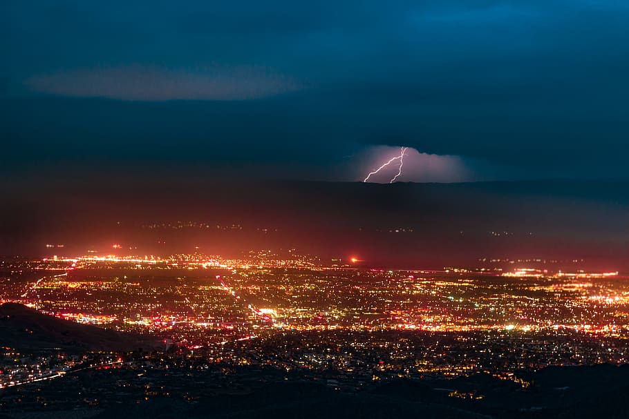 Aerial Photography of Urban City Overlooking Lightning during Nighttime HD wallpaper