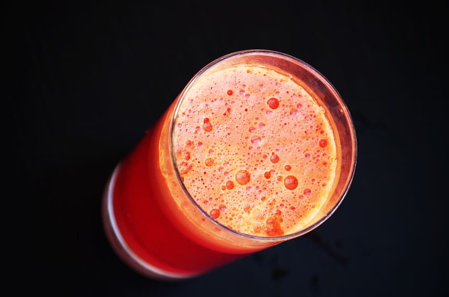 Glass of Orange Liquid in Close Up Photography, beverage, drink HD wallpaper