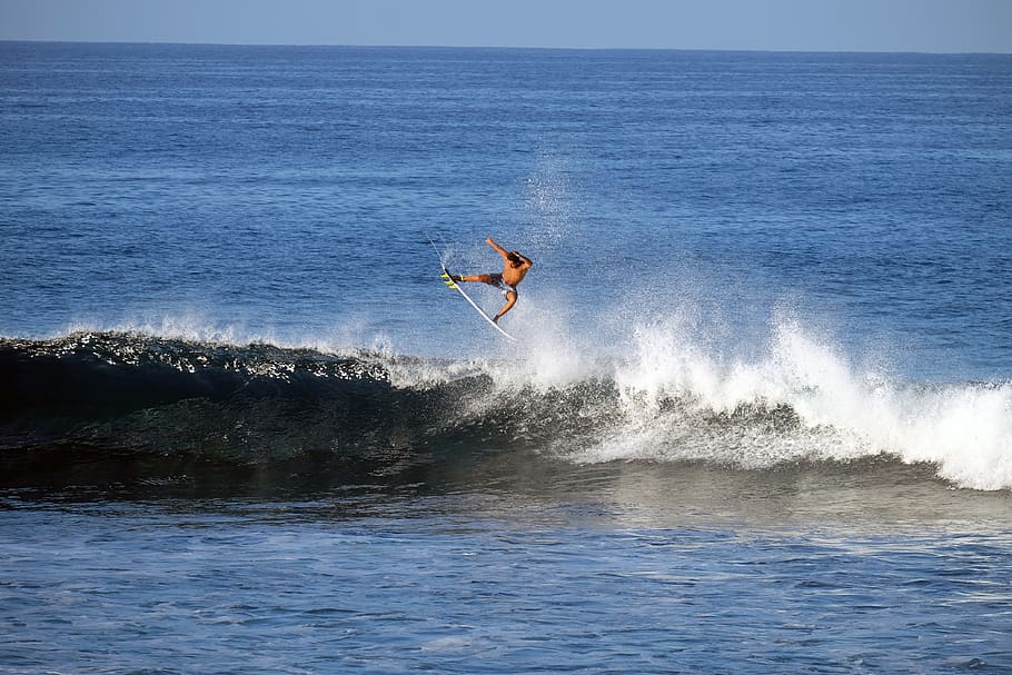 man surfboarding during daytime, sea, water, motion, sport, leisure activity HD wallpaper