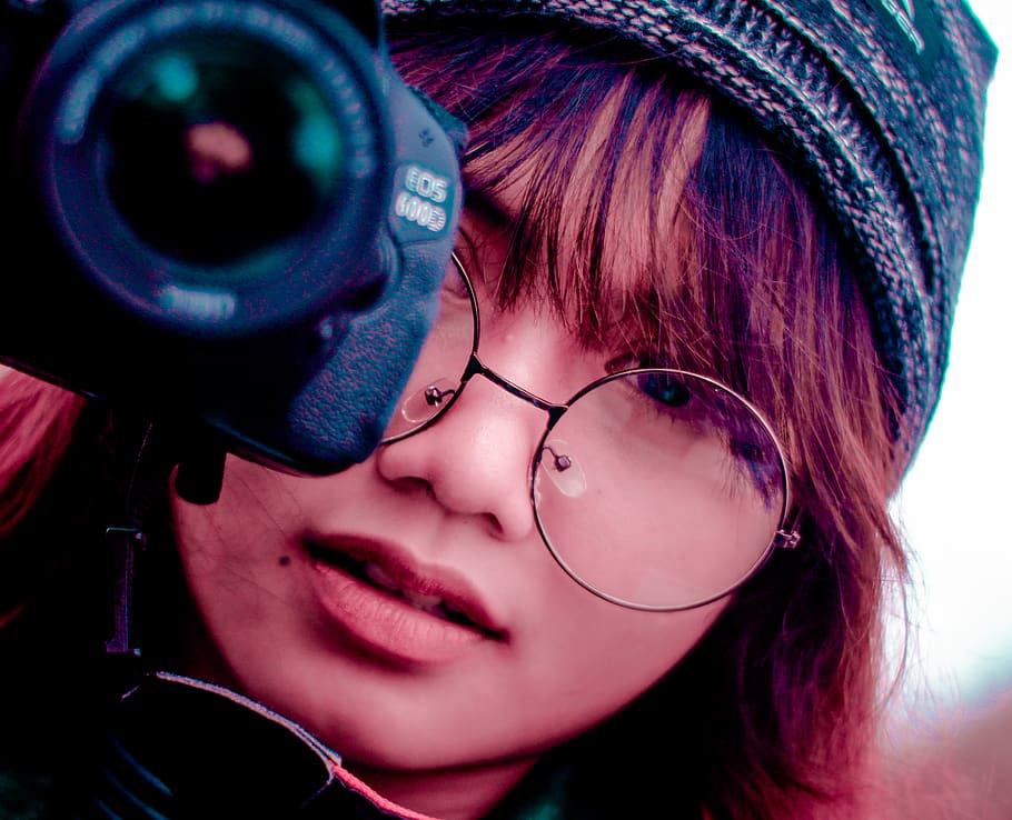 Shallow Focus Photography of Woman Taking a Photo Using Canon Eos 600d Dslr Camera HD wallpaper