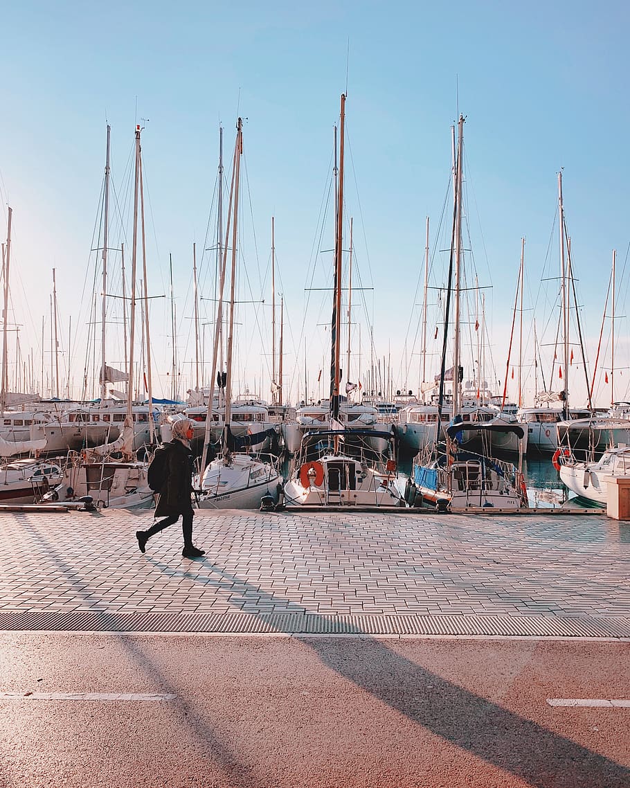 woman walking beside boats, water, human, person, waterfront, HD wallpaper