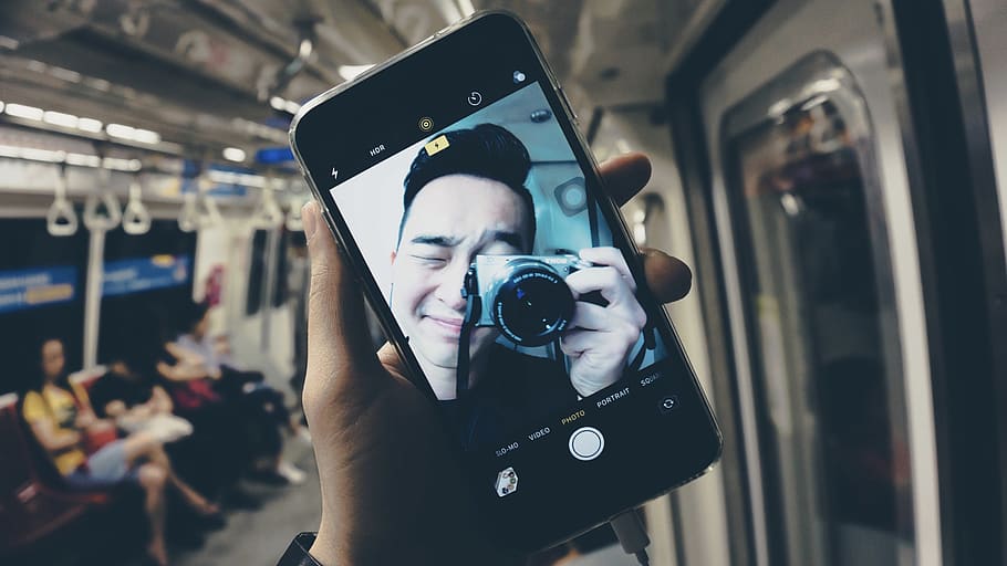 singapore, train, mrt, iphone, camera, male, singaporean, young HD wallpaper
