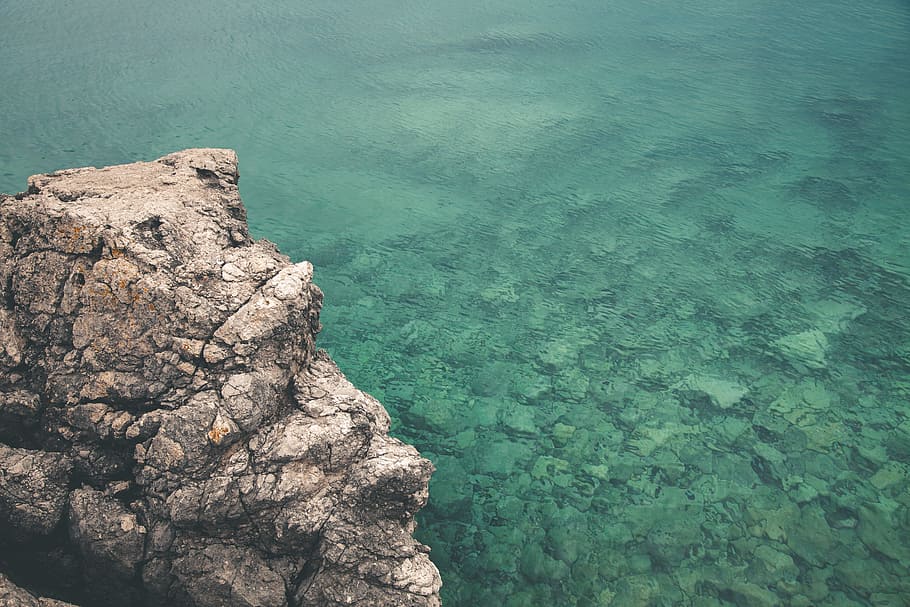 Body of Water Near Mountain, coral, daylight, high angle shot HD wallpaper