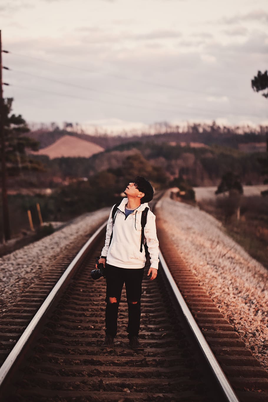 man standing on train rails, transportation, railway, train track HD wallpaper