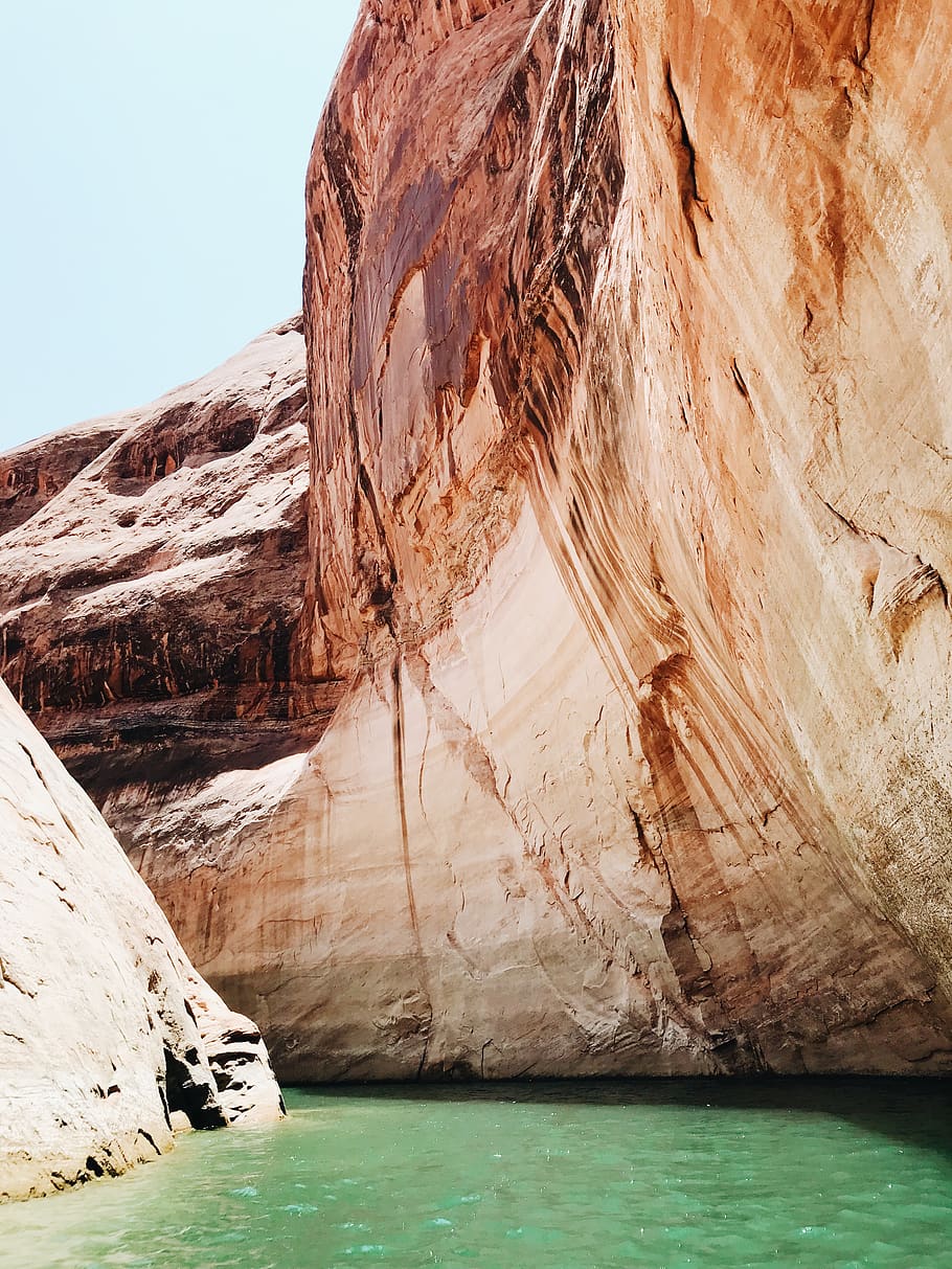 river between brown mountains during daytime, rock, rock formation HD wallpaper
