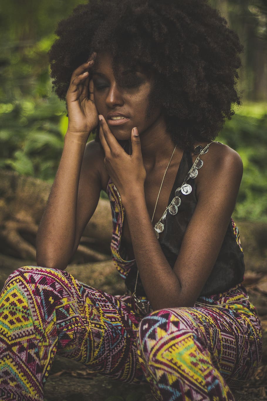 Woman Touching Face While Sitting on Tree Branch, afro, beautiful HD wallpaper