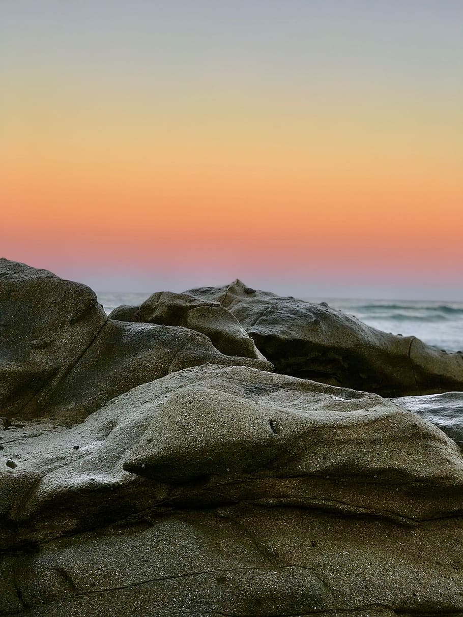 gray boulder, rock, sea, ocean, sunset, gradient, landscape, outdoor, HD wallpaper