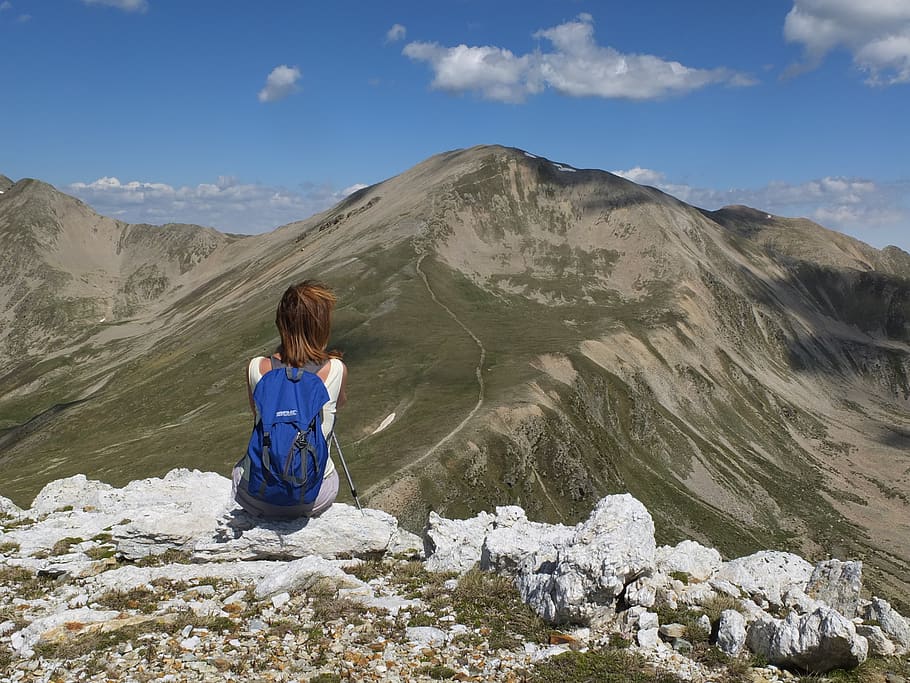 Woman Sitting on Rock Front of Mountain, adventure, cliffs, climb HD wallpaper