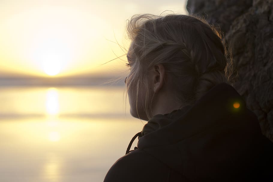 light, sunset, ocean, looking, hair, person, woman, headshot HD wallpaper