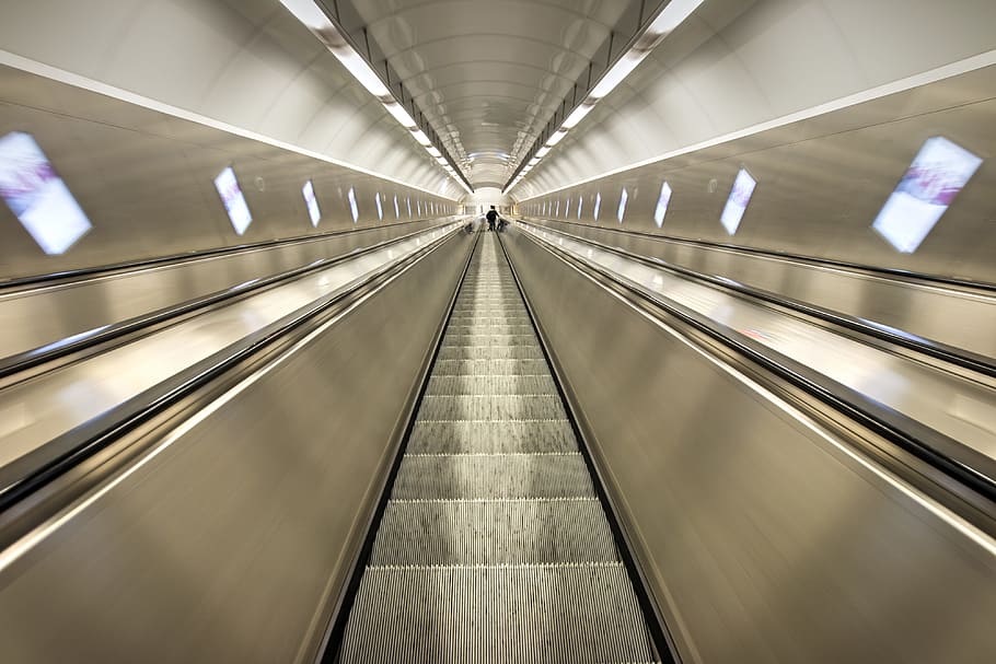 Luxury tunnel with the escalator to the metro station, transportation