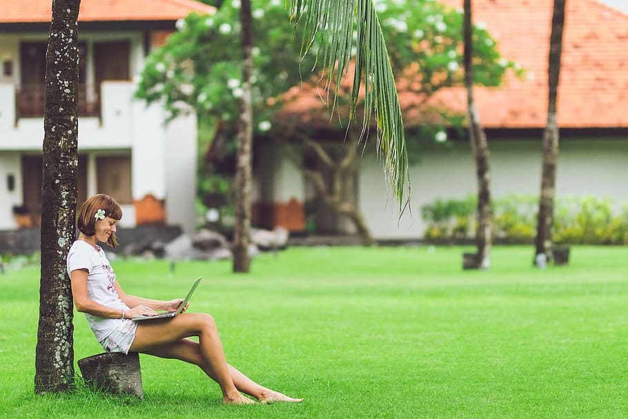 Smiling Woman Sitting While Using Laptop, casual, computer, female HD wallpaper
