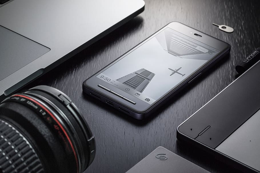 Black Android Smartphone on Black Surface, black-and-white, devices HD wallpaper
