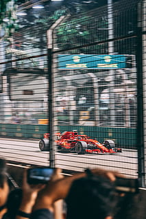 red F-1 car on street, race, ferrari, motion, blur, track, phone wallpaper HD wallpaper