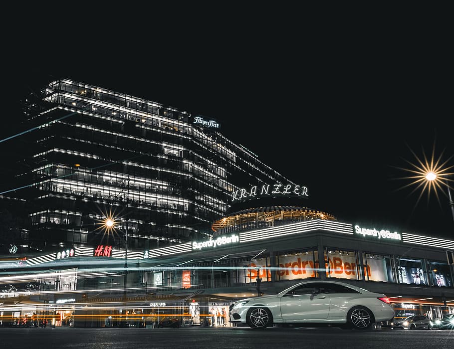 silver coupe parked near Xranzier building during night time, HD wallpaper