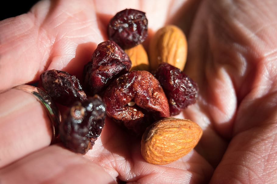 trail mix, hand, cranberries, almonds, healthy, roughage, minerals HD wallpaper