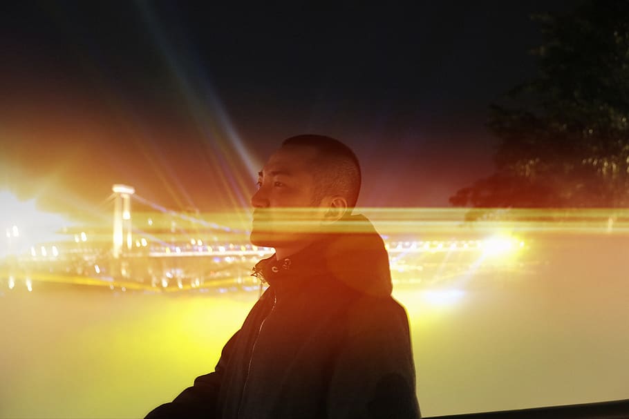 man wearing gray jacket, light, flare, person, human, lighting HD wallpaper