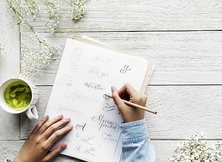 Person Holding Pencil Writing On a Paper, calligraphy, lance HD wallpaper