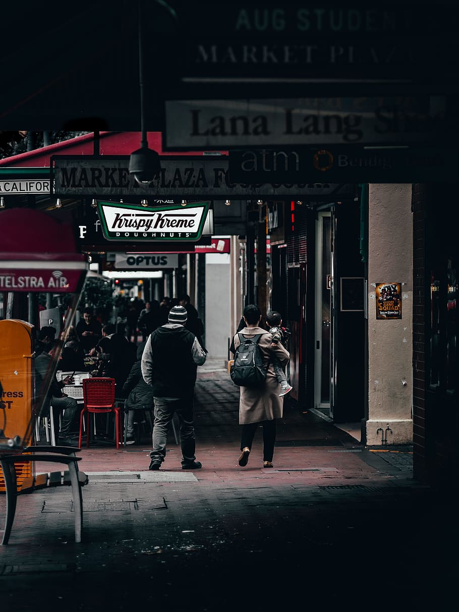 person standing in front of Krispy Kreme store, candid, street, HD wallpaper