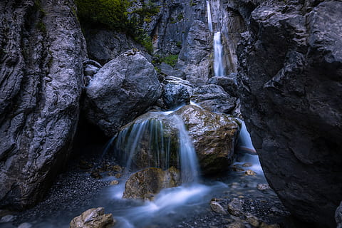 waterfall surrounded by rock formatio n, river, flow, stone, tyrol HD wallpaper