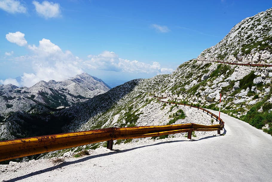Photo of Narrow Paved Mountain Road with Barrier., landscape HD wallpaper