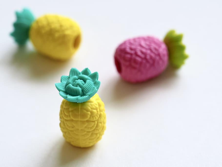 Three Plastic Pineapple Figures on White Surface, blur, bright HD wallpaper
