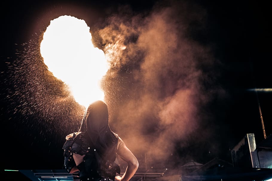 Person Standing Beside Fire during Night Time, dance, explosion HD wallpaper