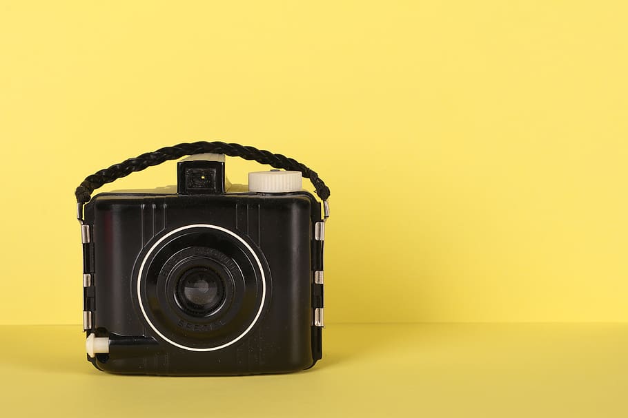 Black Camera On Yellow Surface, analog, Analogue, classic, technology HD wallpaper