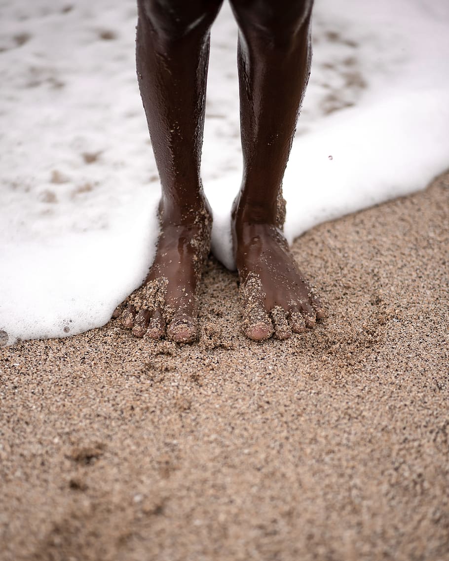 person standing on seashore, beach, feet, sandy, wave, seaside