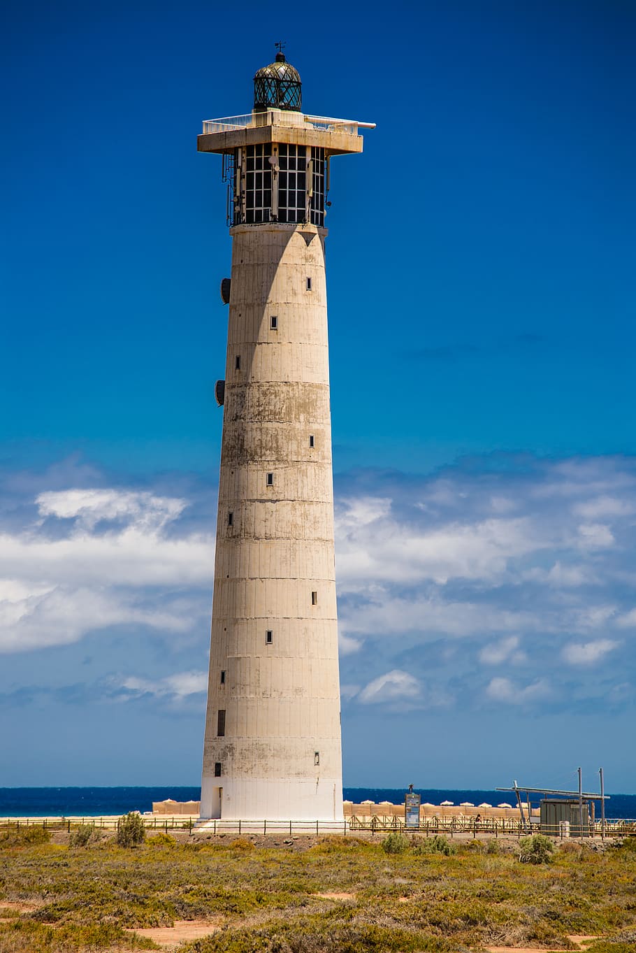 lighthouse, sea, island, sky, blue, architecture, built structure HD wallpaper