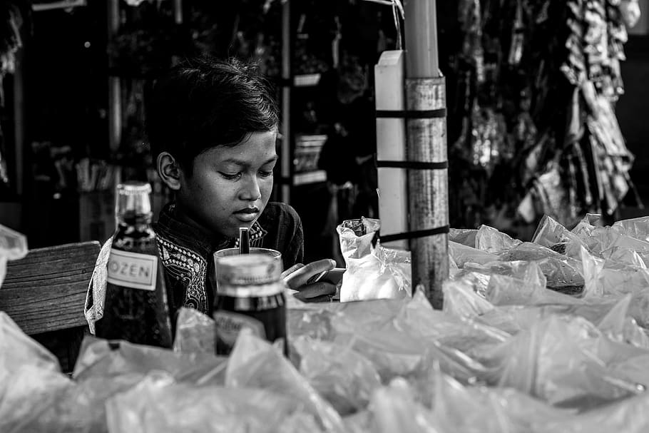 boy sitting near table looking down, human, person, kandangan HD wallpaper