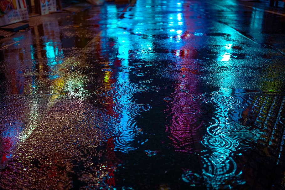 wet concrete road, yellow, purple, green, blue, background, reflection