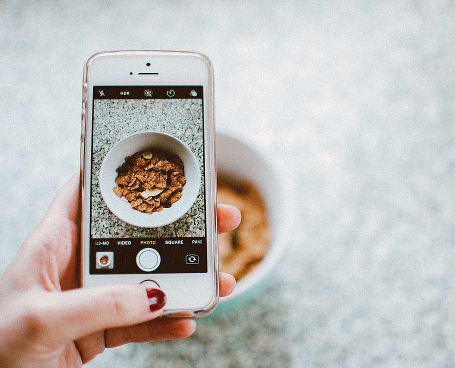White Iphone 4 , cereal, cornflakes, food, hand, screen, smartphone HD wallpaper