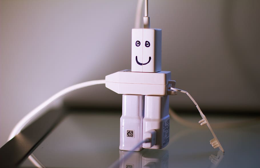 Four White Travel Adapters, blurred background, cable charger HD wallpaper