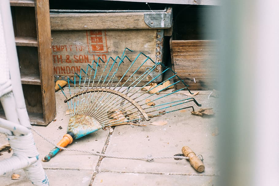 rake on pavement beside box, one person, real people, working HD wallpaper