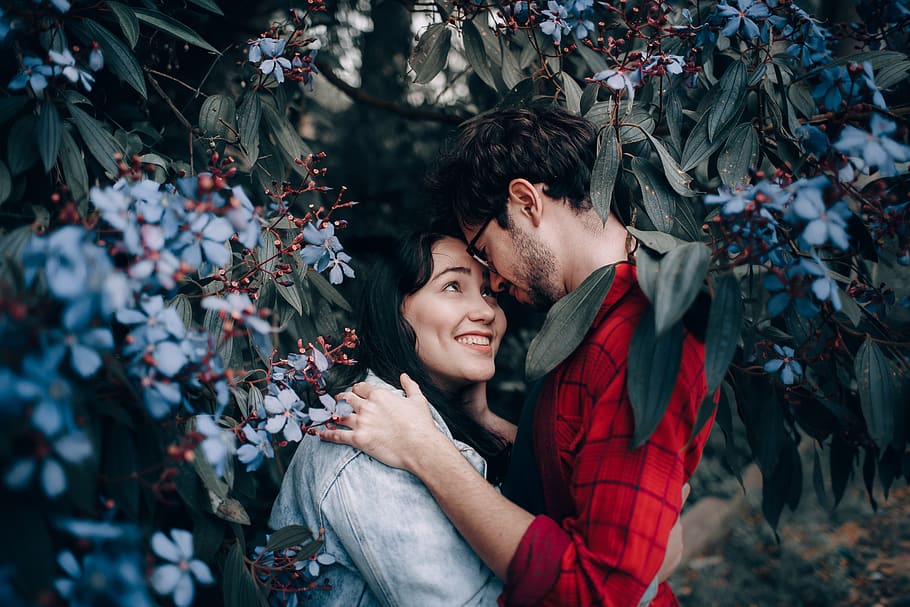 Man and Woman Hugging in the Middle of Flowers, adults, boyfriend